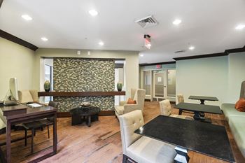 Business center with mac computers and printers 