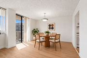 Arlington apartment for rent - A dining room with a table and chairs.