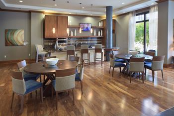 Elaborate clubroom equipped with full kitchen, bar, billiards table and more