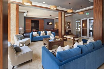 Elaborate clubroom equipped with full kitchen, bar, billiards table and more