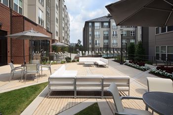 Beautifully landscaped courtyard with grilling areas