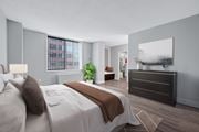 Arlington apartment for rent - A bedroom with a large bed and a dresser.