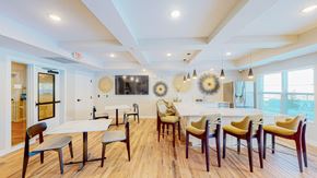 Lakeville apartment for rent - A dining room with a white table and chairs.