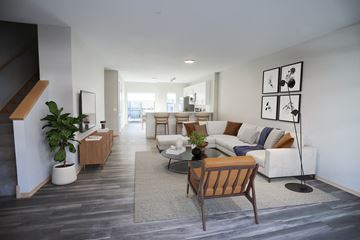 St. Louis Park townhouse for rent - a living room with a couch and a table