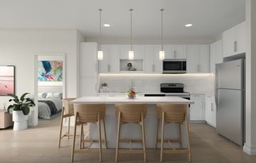 Brooklyn Park apartment for rent - A modern kitchen with a dining table and chairs.