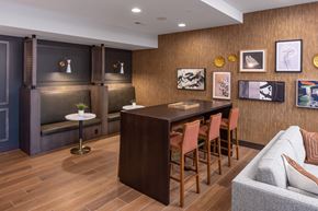 Richfield apartment for rent - a dining room with a table and chairs and a couch