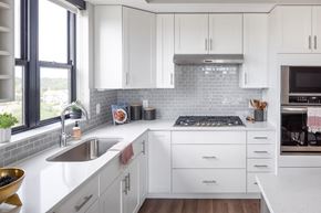 Richfield apartment for rent - a white kitchen with a sink and a window