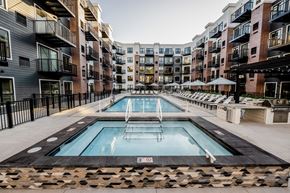 Minnetonka apartment for rent - a swimming pool in the middle of an apartment building