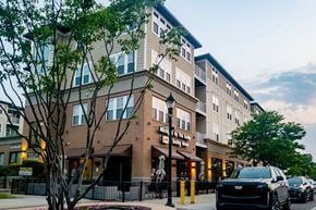 Auburn Hills apartment for rent - a building on a city street with cars
