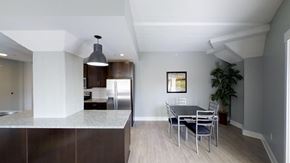 Grand Rapids apartment for rent - a kitchen and dining room with a table and chairs