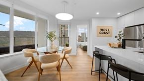 Coquitlam apartment for rent - A modern kitchen with a dining table and chairs.