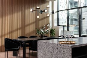 Coquitlam apartment for rent - A modern dining area with a table set for two.