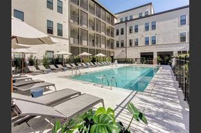 Mount Pleasant apartment for rent - a swimming pool is between two apartment buildings
