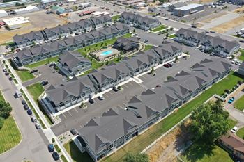 A row of houses with gray roofs