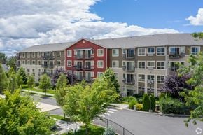 Walla Walla apartment for rent - A large apartment complex with a red building in the front.