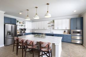 Fort Worth apartment for rent - A kitchen with a table and chairs in the middle.