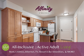 Walla Walla apartment for rent - A kitchen with wooden cabinets and a sign that reads "Affinity at Walla Walla.".