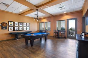Round Rock apartment for rent - A room with a pool table and a bar.