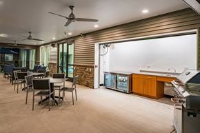 Burlington apartment for rent - A modern kitchen with a dining table and chairs.