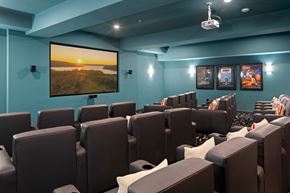 Richland apartment for rent - A cinema room with a large screen and comfortable seating.