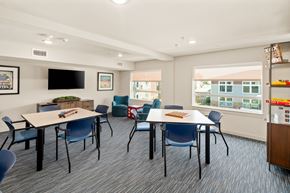 Nampa apartment for rent - A conference room with a long table and chairs.
