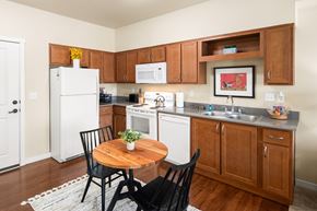 San Antonio apartment for rent - A kitchen with a table and chairs in the middle of it.