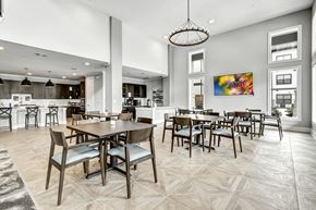 Fort Worth apartment for rent - A modern dining room with a large table and chairs.
