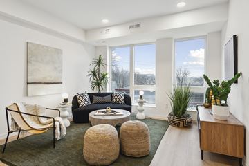 Minneapolis apartment for rent - a living room with a couch and chairs and a table