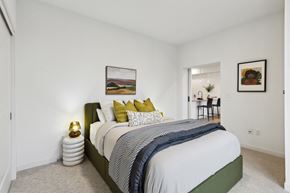 Minneapolis apartment for rent - a bedroom with a large bed and white walls
