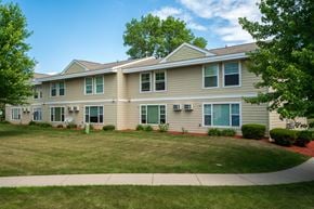 Burnsville townhouse for rent - the front of a house with a lawn and trees