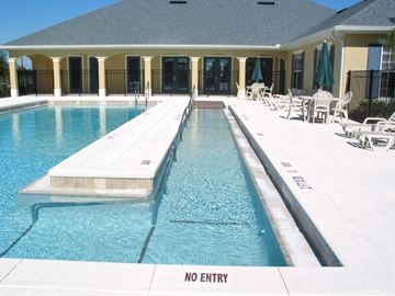 Ruskin apartment for rent - a swimming pool in front of a house with a no entry sign