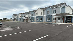 Windom apartment for rent - an empty parking lot in front of a building