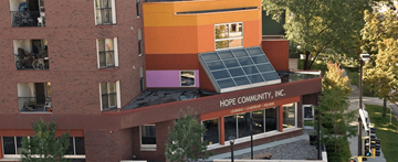 Minneapolis triplex for rent - A building with a Hope Community Inc. sign on the front.