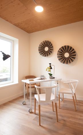 Oakland apartment for rent - a dining room with a white table and chairs and a window