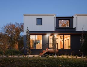 Saint Paul apartment for rent - A modern house with a black and white exterior is shown.