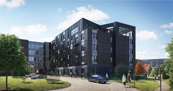 A rendering of a large building with a street in front of it