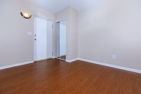 Eastlake apartment for rent - a bedroom with hardwood floors and white walls