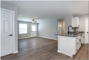 North Ridgeville apartment for rent - an empty kitchen and living room with an open floor plan