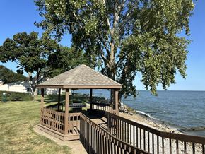 Huron apartment for rent - A gazebo sits on a wooden deck overlooking Lake Erie