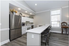 Madison apartment for rent - a kitchen with a large island and stainless steel appliances