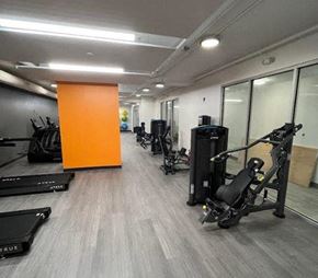 Cleveland apartment for rent - a room with a bunch of exercise equipment in it