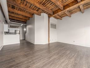 Cleveland apartment for rent - an empty room with white walls and a wooden ceiling
