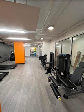 Cleveland apartment for rent - a room filled with lots of exercise equipment