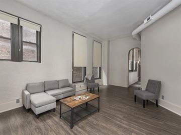 Cleveland apartment for rent - a living room with a couch and a coffee table