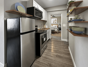 Brook Park apartment for rent - a kitchen with a refrigerator and a microwave