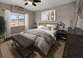 Brook Park apartment for rent - a bedroom with a bed and a ceiling fan