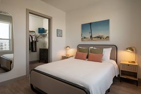 Cleveland apartment for rent - A bedroom with a large bed and a painting on the wall at The Park Apartments, Cleveland , OH