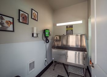 A large metal machine in the corner of a room