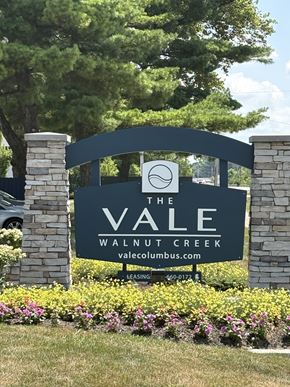 Columbus apartment for rent - A sign for The Vale Walnut Creek is shown in front of a green tree.