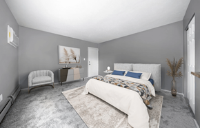 Cleveland apartment for rent - a bedroom with a bed and a chair in 44110